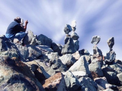 Bill Dan balancing on shoreline