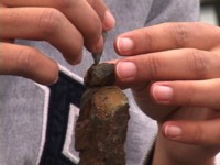 girl-hands-rock
