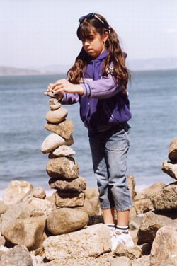 Girl with tall stack