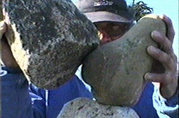 Bill putting two stones together